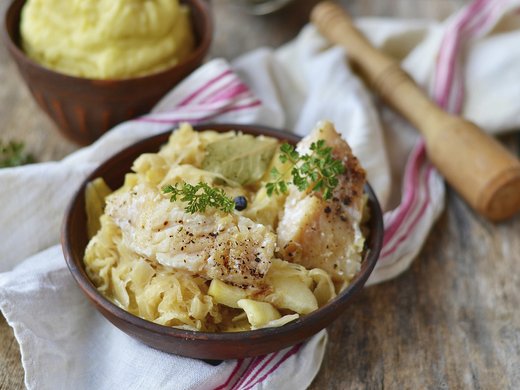 Pike-perch with sauerkraut and mushroom & white wine sauce