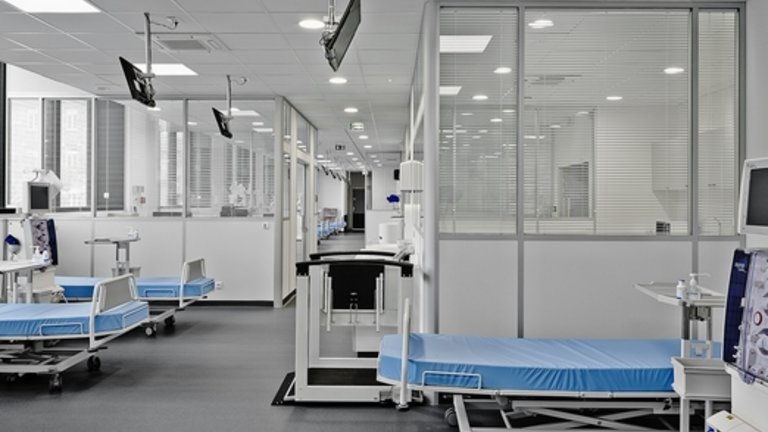 Inside view of a clinic with several empty beds