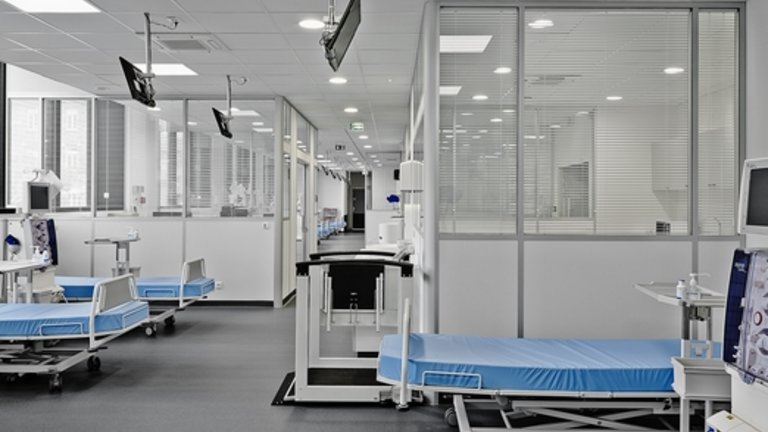 Inside view of a clinic with several empty beds